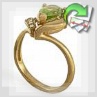 Золотое кольцо с хризолитом и бриллиантами "Райская капелька"